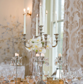 Spectacular candelabras add a touch of elegance to a wedding breakfast.