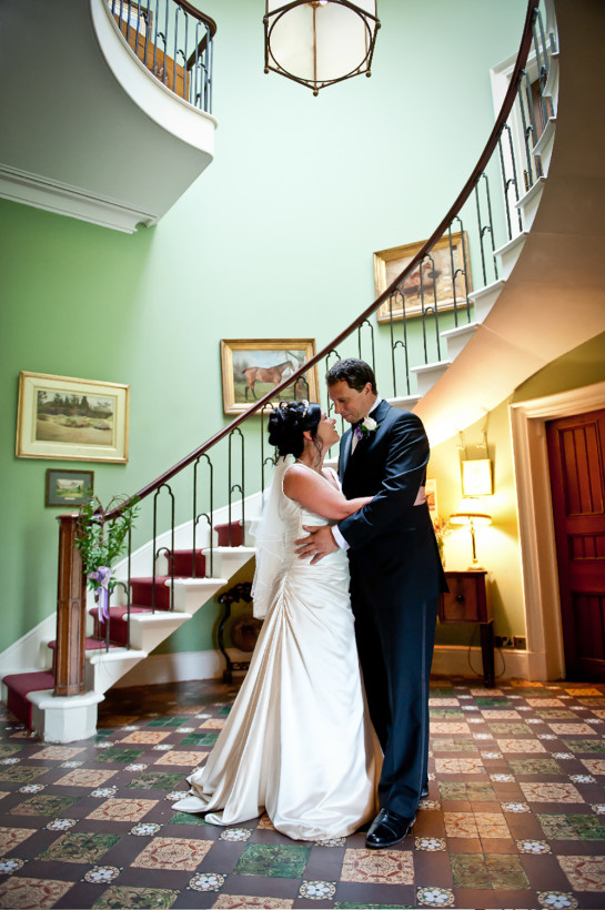 The cantilevered staircase is perfect for stunning wedding portrait photographs.