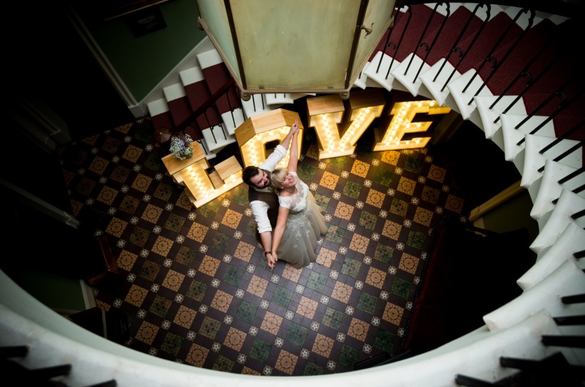 LOVE letters provided by ‘Aisle Hire It’ used at the bottom of the staircase at a personal wedding